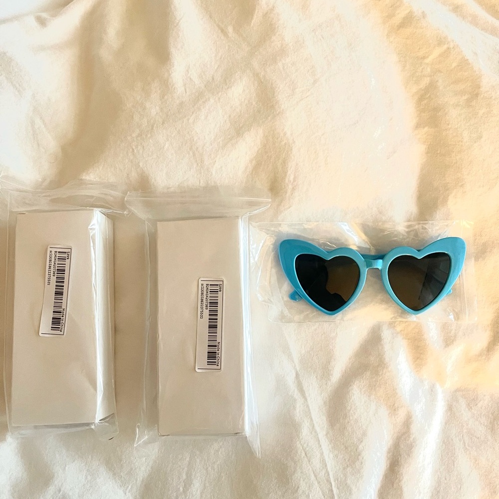 Blue heart shaped sunglasses